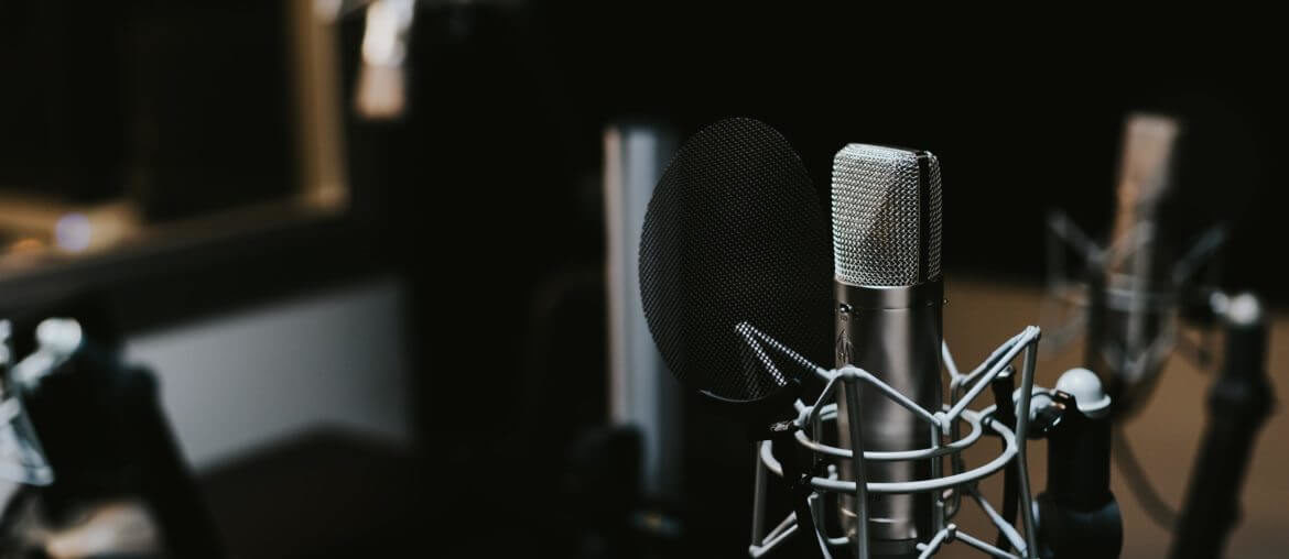 using a microphone after writing a professional voice recording script